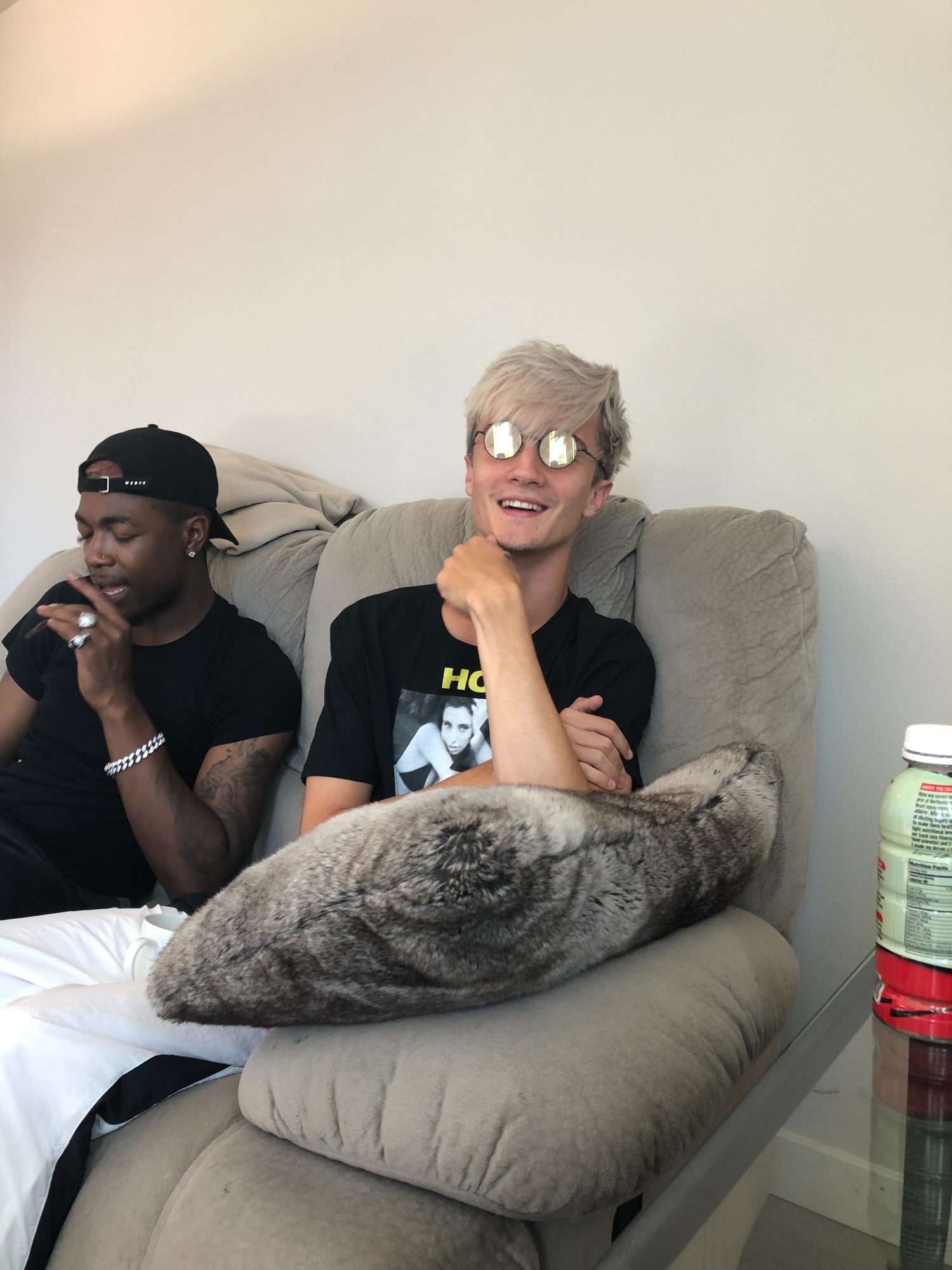 Johnny laughing on the couch